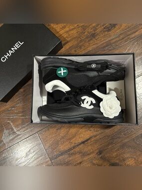 CHANEL Black Sneakers with White Camellia and CC Logo